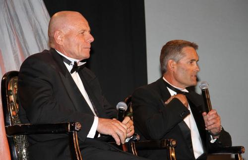 Again, little love seems to be lost between ETNZ’s Grant Dalton (left) while his rival, Russell Coutts, makes a point at the black tie dinner, in Auckland. © Richard Gladwell www.photosport.co.nz